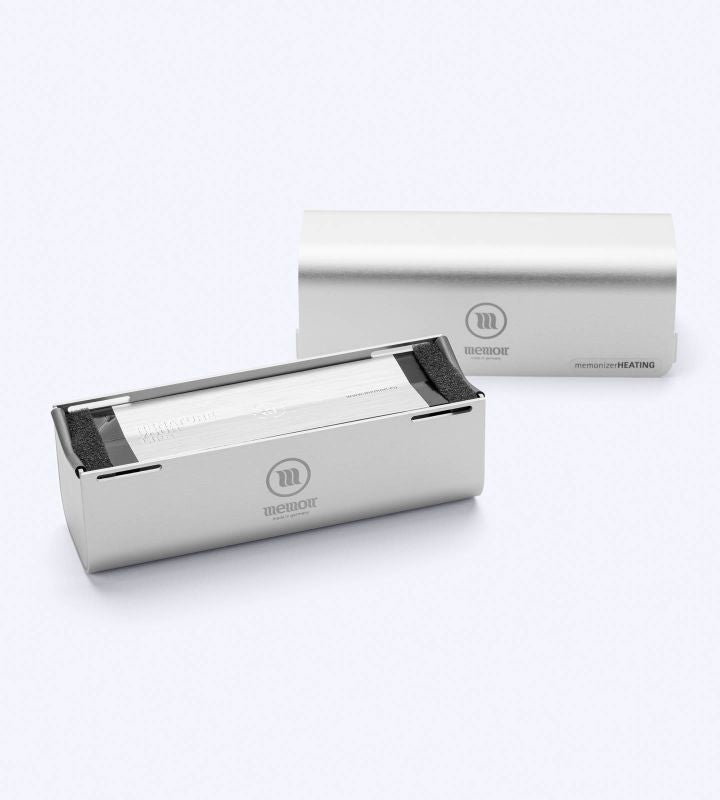 Memon voor verwarmingssystemen. Afbeelding van een cv- of verwarmingsinstallatie in combinatie met Memon-harmonisatie van elektromagnetische velden en installaties in huis. Vierkante product- of sfeerfoto 800x800.