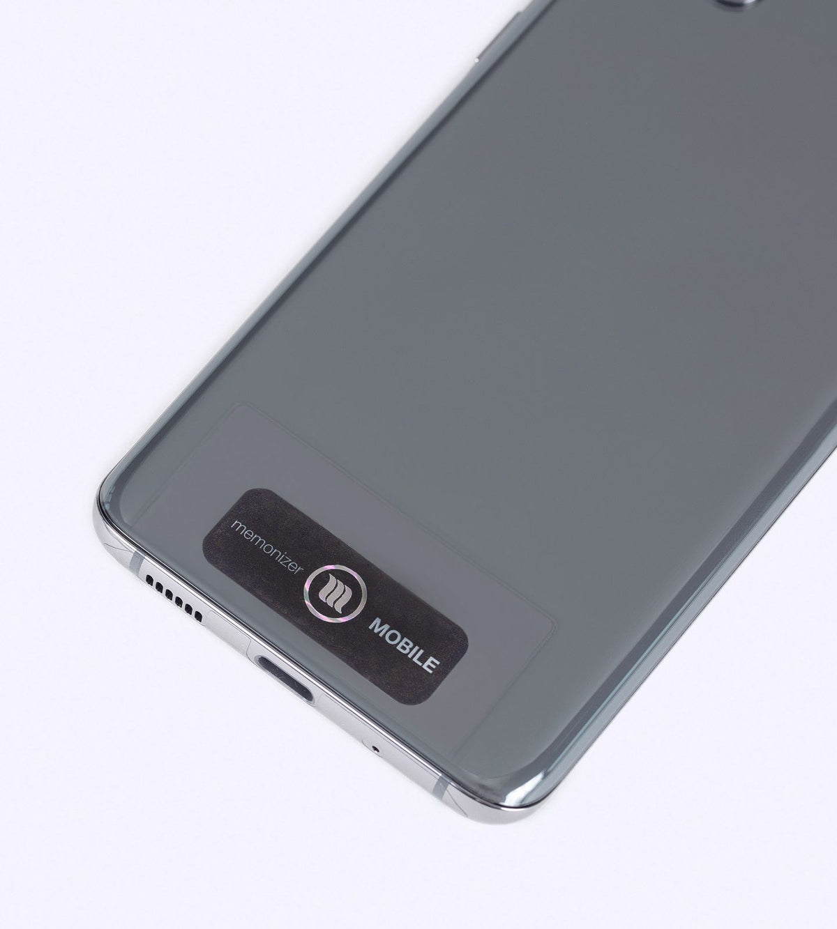 MemonizerMOBILE, in zwart, op een Samsung-toestel geplakt